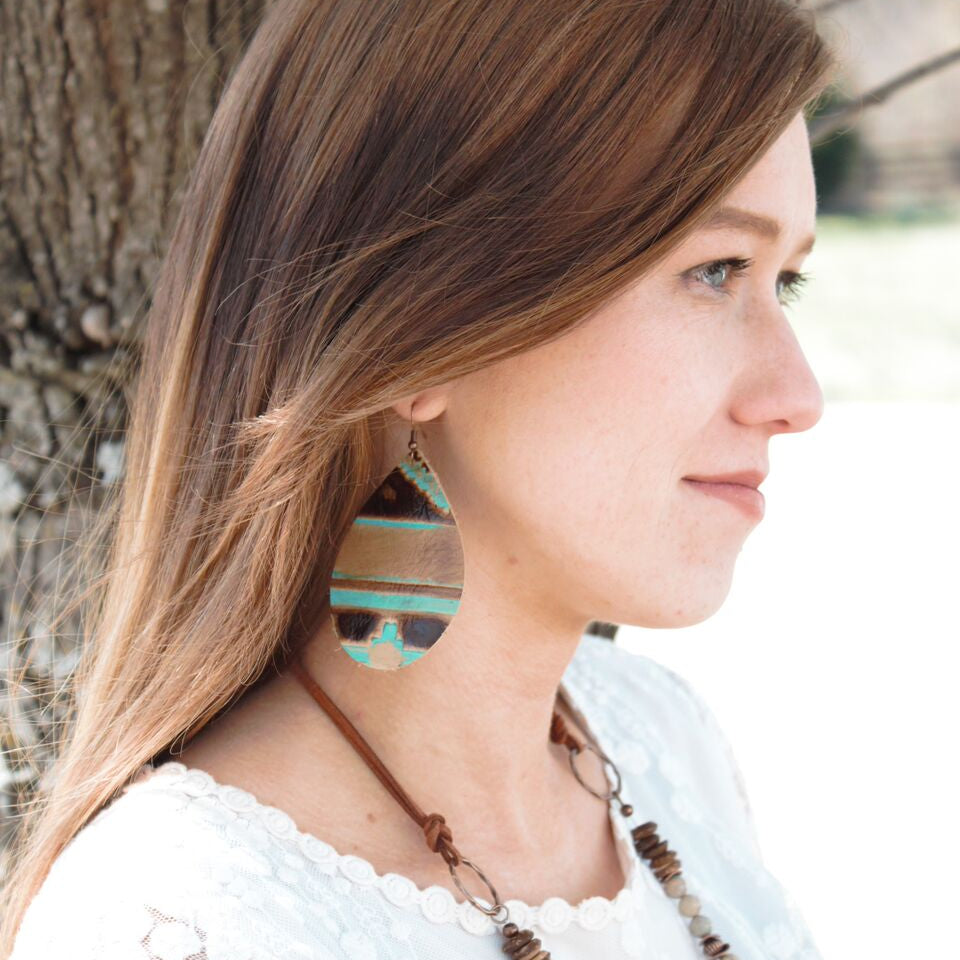 Woman wearing Leather Oval Earrings in Turquoise Navajo