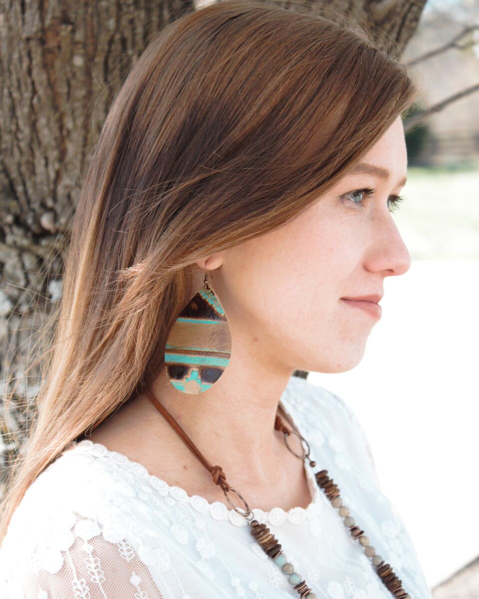 Woman wearing Leather Oval Earrings in Turquoise Navajo