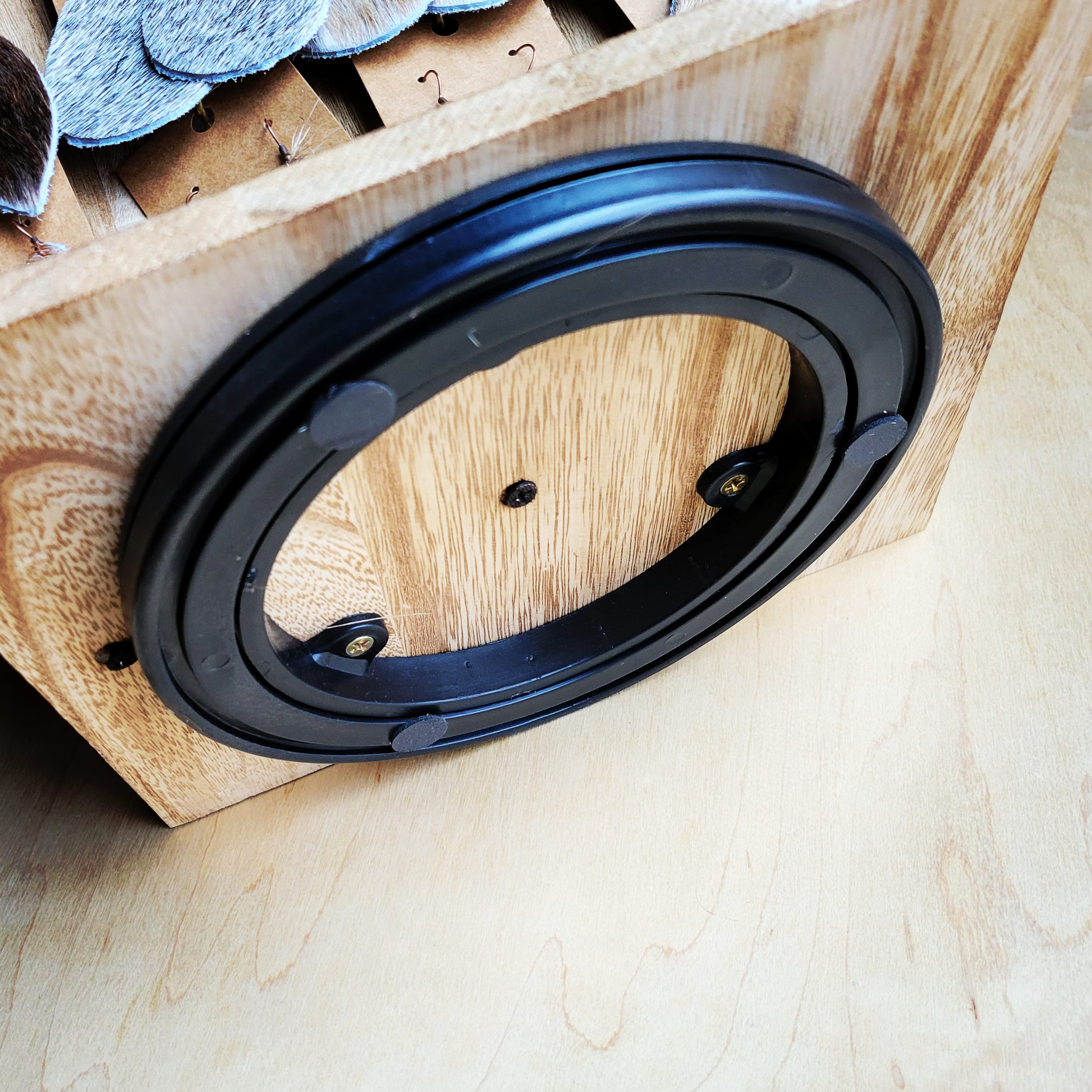 Embossed Leather Earring With Wood Rotating Display