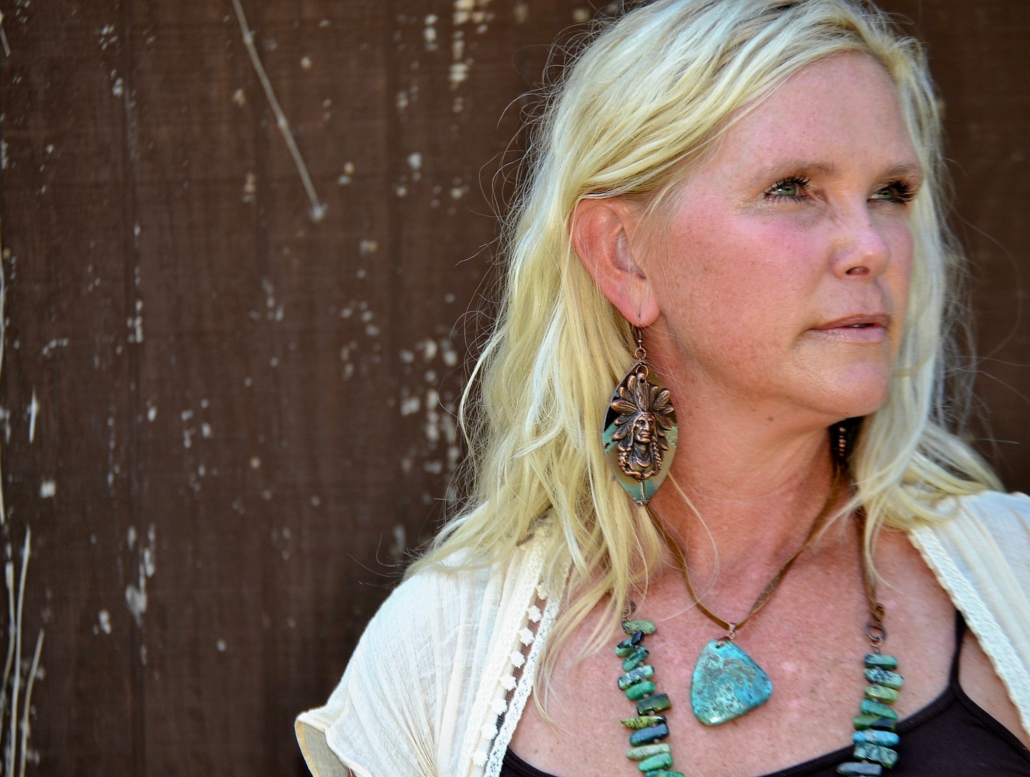 Model Wearing Leather Necklace with Natural Turquoise Pendant-Tan