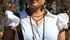 Model with Double Strand Lariat African Turquoise Necklace w/ Feather