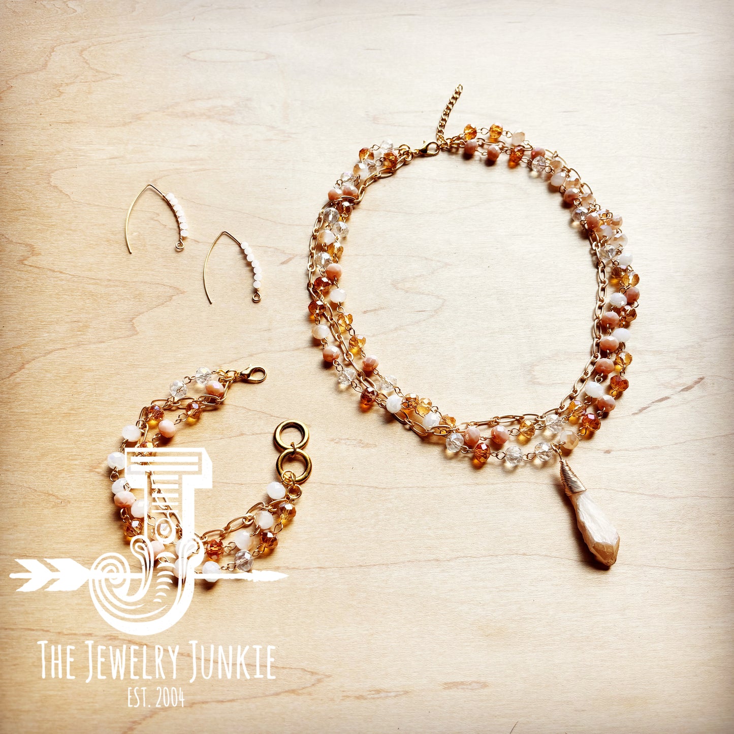 **Champagne Triple Strand Beaded Bracelet