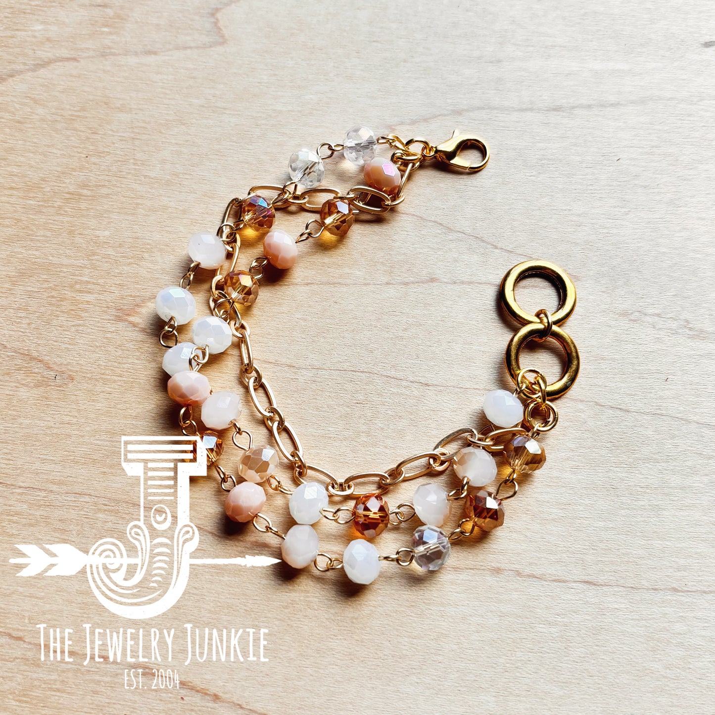 **Champagne Triple Strand Beaded Bracelet