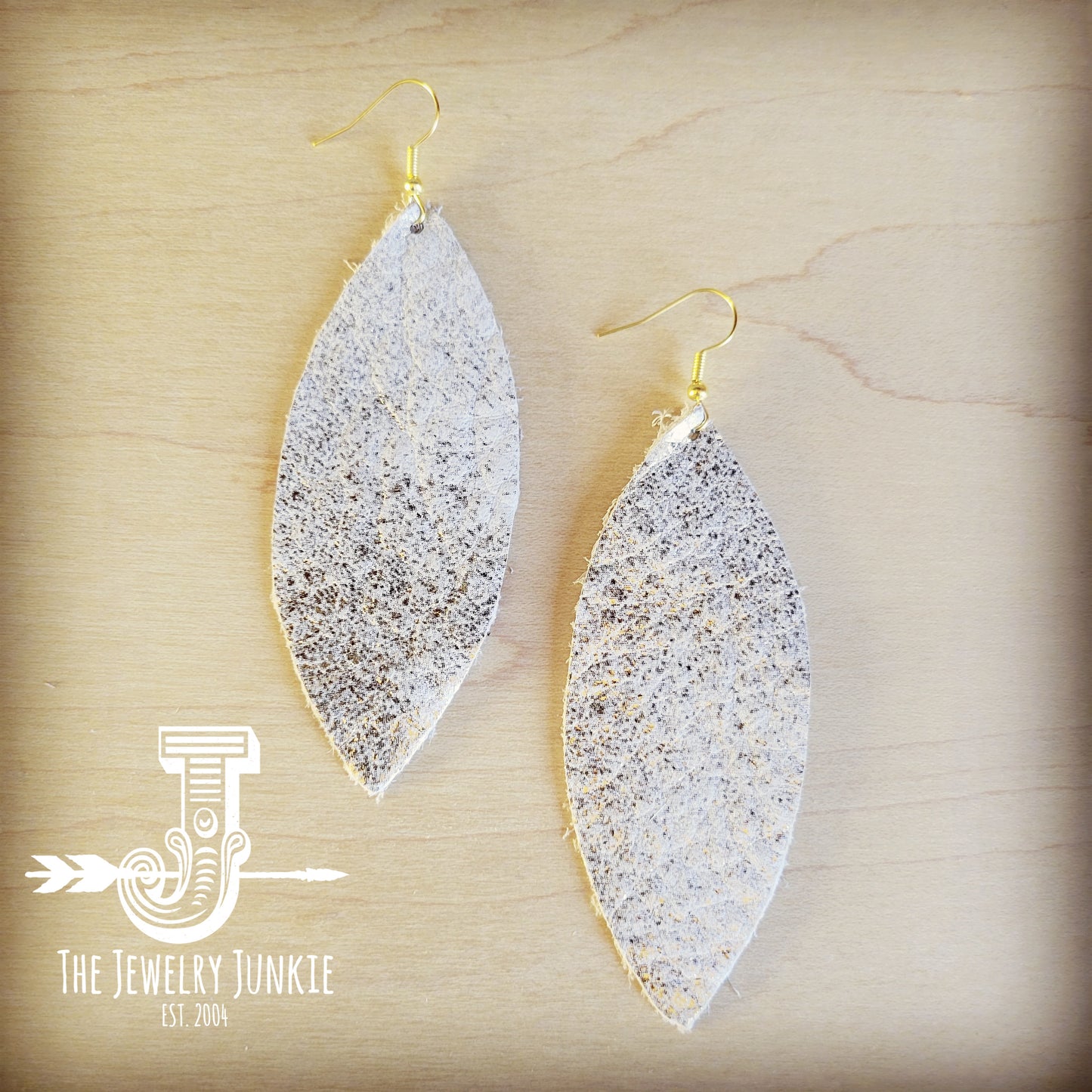 Leather and metal earrings deals
