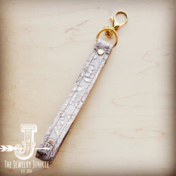 **Embossed Leather Key Chain Strap Gilded Cowboy 702g