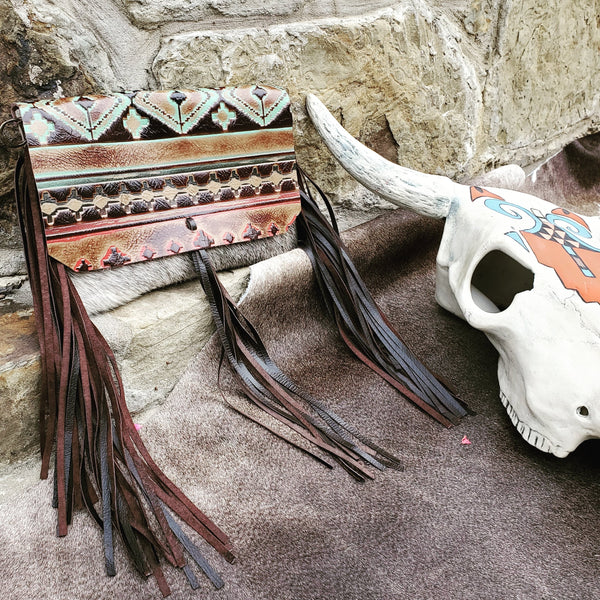 A leather clutch with Navajo flap from Jewelry Junkie