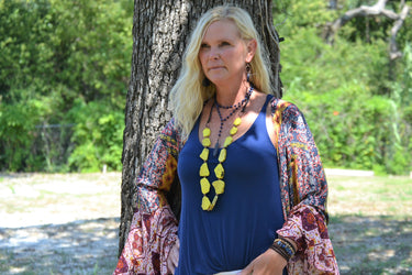 Women Wearing Double Strand Lariat in Frosted Blue Lapis with Copper Feather