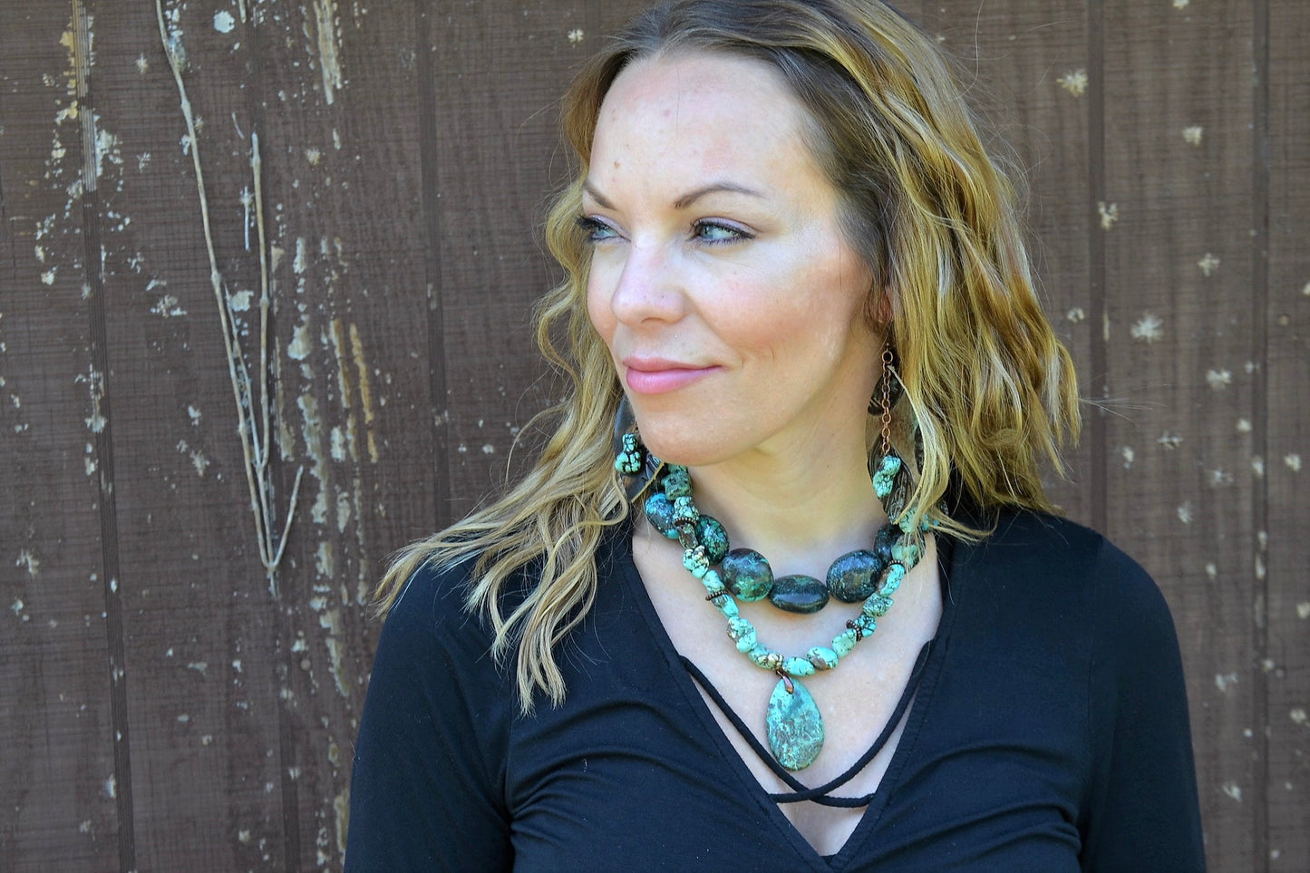 Woman Wearing Chunky Turquoise Necklace w/ Natural Teardrop Pendant